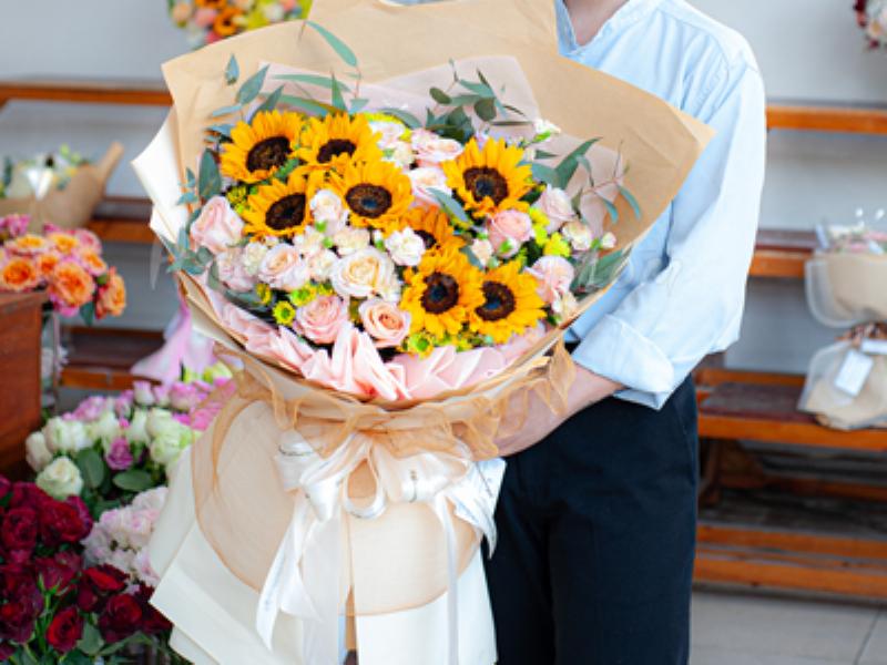 Một bó hoa Cẩm Chướng rực rỡ nhiều màu sắc, thể hiện sự lạc quan, đa dạng và tinh thần tự do của cung Nhân Mã